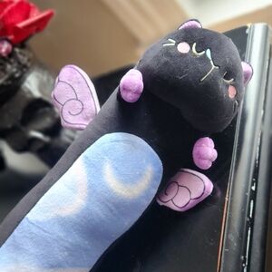 Black Plush Cat Pillow with Purple Wings and Blue Belly